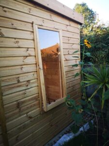 Oak garden building window