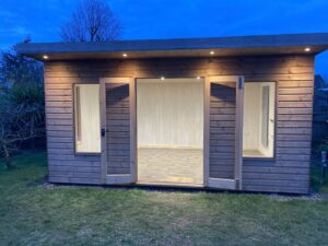 Garden building with lights at night